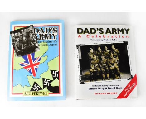 DAD'S ARMY; two books related to the TV series, each bearing numerous signatures (2).We have not authenticated these signatur