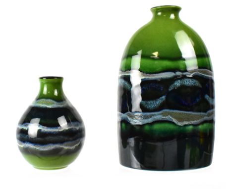 POOLE; a medium oval bottle vase, height 23cm and a squat baluster vase, height 13.5cm, both in the 'Maya' design, initialled