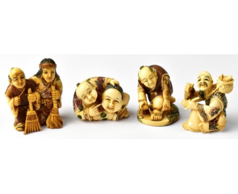 Four Japanese carved netsuke comprising a seated figure holding a mask, a man carrying a basket of fish and holding a pipe, a