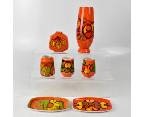 POOLE: a group of seven ceramics, in the 'Delphis' and other patterns, to include a tall cylindrical vase, height 24cm, two o