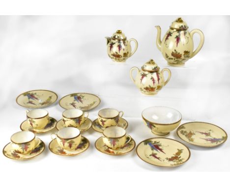 A 20th century Japanese tea service comprising teapot, coffee pot, sucrier, sugar bowl, six cups and saucers and six plates, 