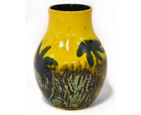 POOLE; a baluster vase with mustard ground and abstract long grass and wild flower decoration, indistinctly initialled to bas