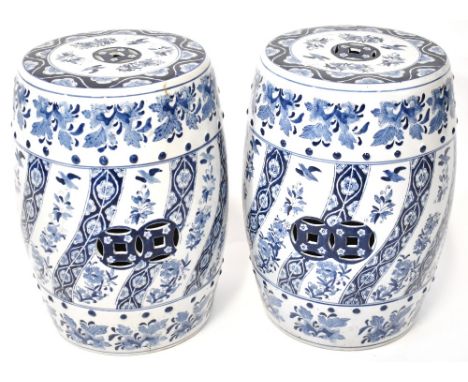 A pair of Oriental ceramic blue and white barrel-shaped reticulated garden seats, 47 x 35cm (2).Provenance: Part of the Paul 