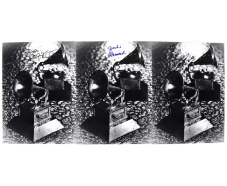 Three reproduced black and white photographs of Grammy Awards, each bearing a single signature - Quincy Jones, Joni Mitchell 