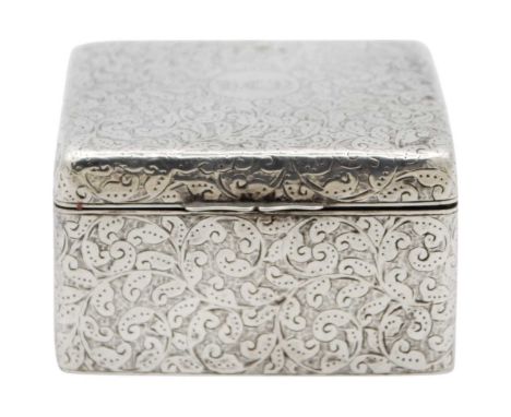 A Victorian silver hinge lidded trinket box by A & J Zimmerman Ltd. Of square section, with foliate scroll engraved decoratio