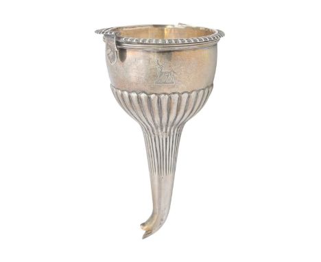 A George III silver wine funnel by William Burwash. Of gadrooned half-fluted form, London 1817, length 16cm, 5.88 oz.The gadr
