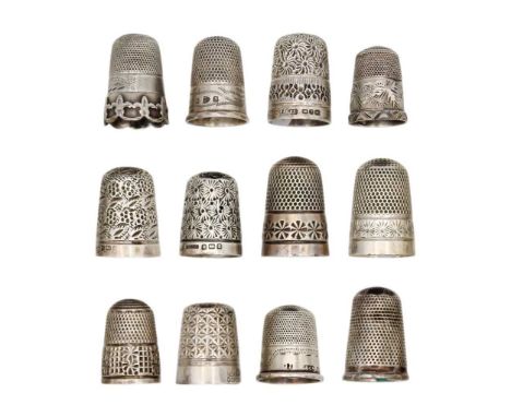 A collection of twelve silver thimbles. Including a Charles Horner 'DORCAS' size 8; a 19th century slim example with fine dim