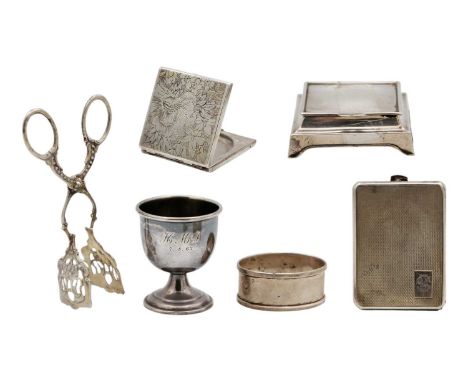 A selection of seven small silver items. To include a George V engine turned matchbook case, Birmingham 1932; a George V two 