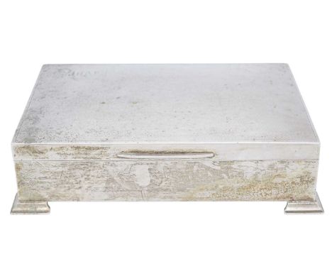 An early 20th-century sterling silver engine turned cigarette box. Stamped 'sterling silver', height 4.5cm, length 17cm, widt