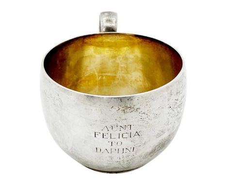 An American silver cup by Shreve & Co, San Francisco. Of plain form with loop handle, stamped STERLING 291, diameter 7cm, 110