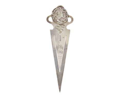 An Art Nouveau silver bookmark by Corke Brothers & Co. The finial cast with a roundal of a sinuous female profile, London 190