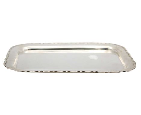 An Edwardian silver rectangular tray by William Hutton & Sons Ltd. With serpentine rim, rubbed hallmarks Birmingham possibly 