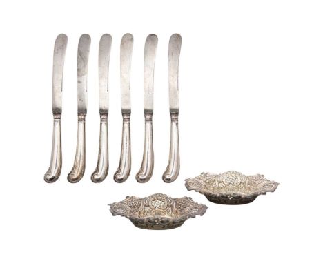A pair of Victorian silver bonbon dishes by James Deakin & Sons. The dishes of oval foliate scroll and pierced form, Chester 