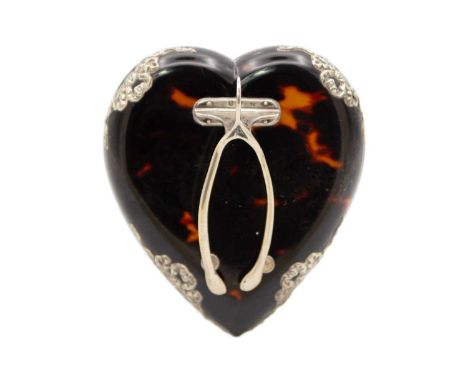 A Victorian silver-mounted tortoiseshell heart-shaped desk letter clip by Henry Atkins. With sprung wishbone clip and ribbon 