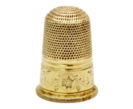 An early 20th-century, high-purity gold (tests 18k) thimble. Fine dimpled and with banding, engraved monogram and interior in