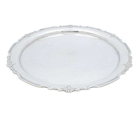 A silver circular salver by Cooper Brothers & Sons Ltd. With leaf and shell cast rim, Sheffield 1956, diameter 30.5cm, 24.6 o