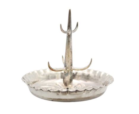 A Victorian silver ring tree by William Hutton & Sons. With scroll embossed decoration, London 1893, diameter 9cm, 1.44 oz.