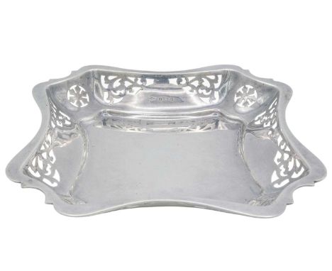 A George V silver bowl with serpentine edge and pierced rim by Joseph Gloster Ltd. Of square section, Birmingham 1924, width 
