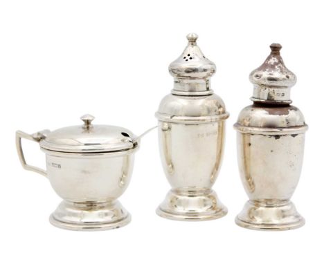 A silver three piece cruet by John Rose. Of pedestal form, comprising mustard and spoon, salt and pepper shakers, Birmingham 