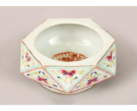 A CHINESE GUANGXU DIAMOND FORM FAMILLE ROSE PORCELAIN BRUSH WASHER, the interior with an iron red dragon, the exterior with e