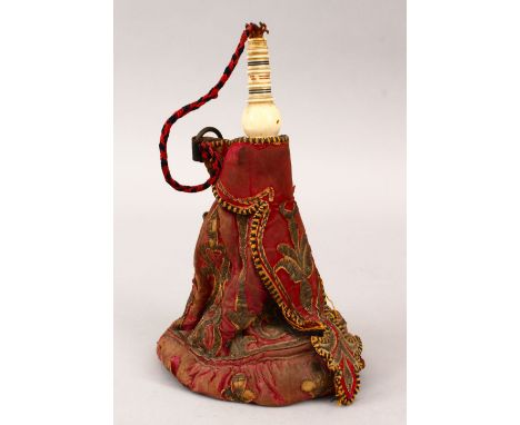 AN EARLY 17TH / 18TH CENTURY TURKISH OTTOMAN METAL THREAD EMBROIDERED VELVET &amp; LEATHER POWDER FLASK, with an ivory top, 2