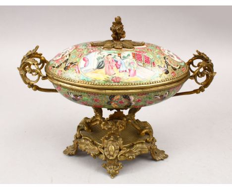 A GOOD 19TH CENTURY CHINESE CANTON FAMILLE ROSE PORCELAIN BOX &amp; COVER WITH ORMOLU MOUNTS, The lidded vessel with panel de