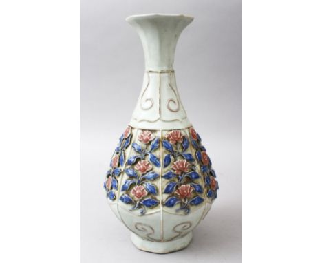 AN UNUSUAL CHINESE MOULDED / CLAIR DE LUNE CELADON BOTTLE VASE, the vase with relief moulded panel decoration depicting flora