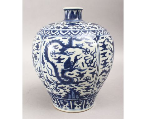 A GOOD CHINESE MING STYLE BLUE &amp; WHITE PORCELAIN VASE, the body decorated with panels of dragons amongst stylized clouds,