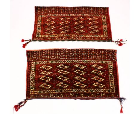 A GOOD PAIR OF PERSIAN FLOOR CARPET CUSHION COVERS with geometric design, each 120cm x 70cm.