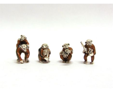 A GROUP OF FOUR SATURNO SILVER AND ENAMEL MONKEYS,  the largest approx 4cm high
