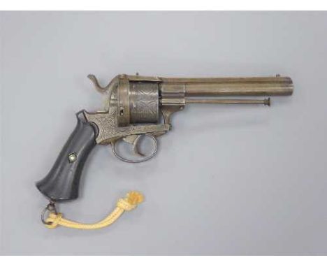 A late 19th century double-action pinfire revolver, the 14cm barrel with ejector rod underneath, the six-shot cylinder with f