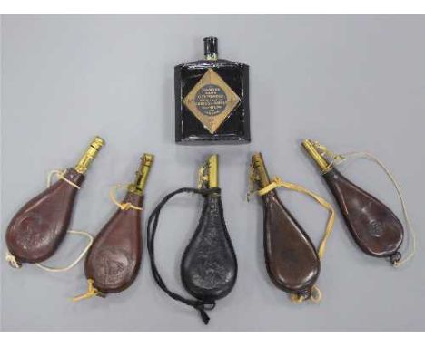 Five assorted embossed leather shot flasks, some containing lead shot, together with a Curtis & Harvey gunpowder flask (6)