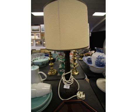 Carved hardwood lamp with shade