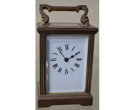 A French lacquered brass carriage timepiece, 6cm rectangular enamel dial inscribed with Roman numerals, key-wound movement wi