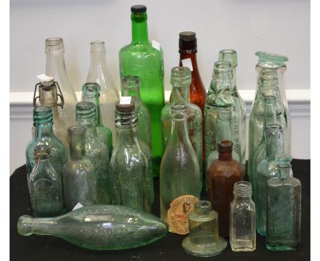 A quantity of glass beer and advertising bottles, to include M Whittaker, Matlock Bath, Kimberley Brewery; Kidgen and Company