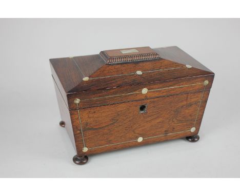 A Victorian rosewood tea caddy, sarcophagus shape with mother of pearl inlay, (converted interior), on button feet, 25cm (a/f