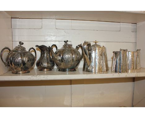 A 19th century French silver plated three piece tea set with cast flower finial and foliate decoration, stamped Armand Frenai