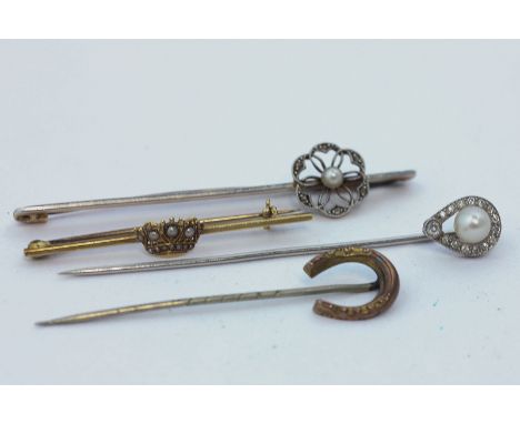 An old cut diamond and pearl stick pin, a horseshoe stick pin, a Naval brooch, and a rose diamond and pearl brooch