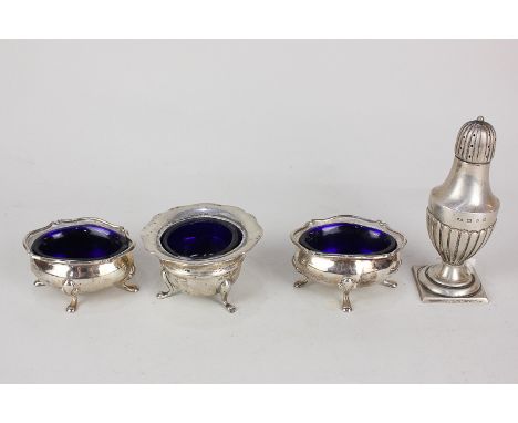 A pair of George V  silver oval salts with blue glass liners, on paw feet, Birmingham 1919, (a/f), a circular salt with shape