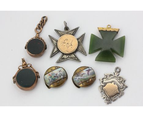 A gold mounted jade Maltese cross pendant, two gold swivel seals, two silver and gold pendants, and a pair of gold, enamel an