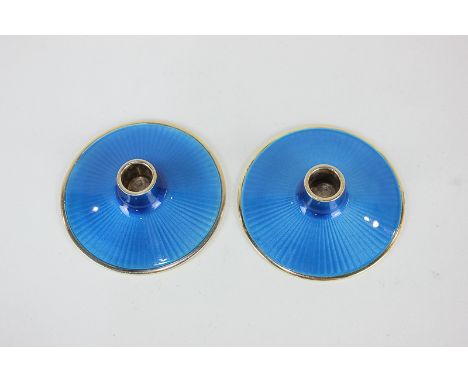 A pair of Norwegian silver gilt and blue enamel candle holders, maker David Andersen, Oslo, marked 925 S, 2cm high