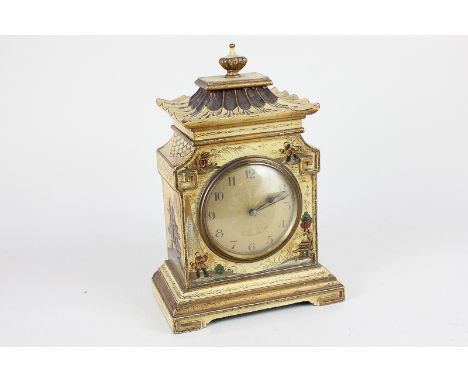 A French chinoiserie mantel clock with circular gilt dial in architectural case with finial, decorated in cream lacquer with 