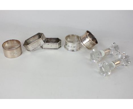 Three modern silver circular napkin rings, a pair of Chinese white metal six-sided napkin rings, and a pair of Edward VII sil