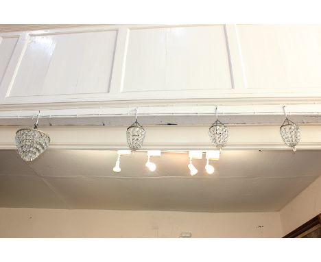 A circular tiered glass droplet light shade, with pear shaped lustre drops, 22cm and three other smaller bag shaped drop ligh