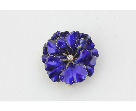 A gold, enamel and diamond flower head brooch, claw set at the centre with a brilliant cut diamond (a/f)