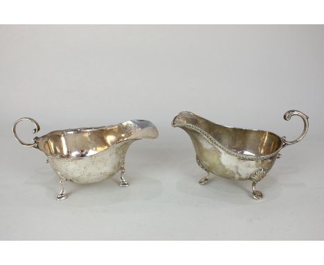 A George V silver sauce boat, maker Asprey, London 1931, together with another silver sauce boat by Elkington & Co, Birmingha