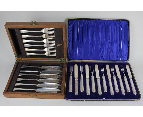 A set of six George V silver handled fruit knives and forks in fitted case, Sheffield 1910 and a cased set of six silver plat