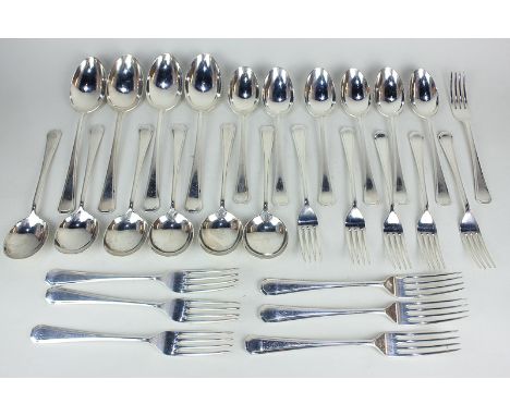 A mid-20th century silver canteen of cutlery to include six dinner forks, dessert forks, six dessert spoons, six soup spoons,