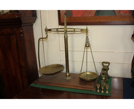 A set of shop brass scales, with dish pans, central column marked Co-Operative Wholesale Society, Birmingham, on rectangular 
