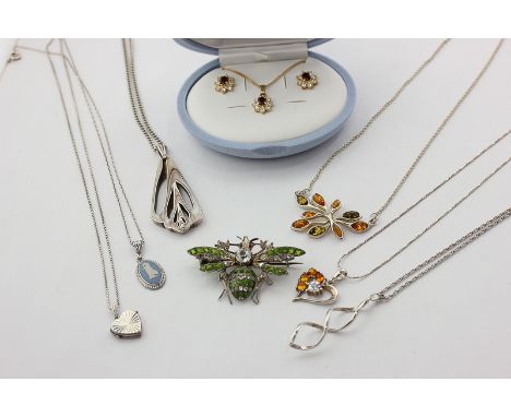 A silver and paste bee brooch, six various silver chains and pendants, a cased costume pendant and earrings